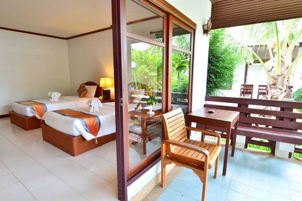 Poolside Bungalow with seating Area