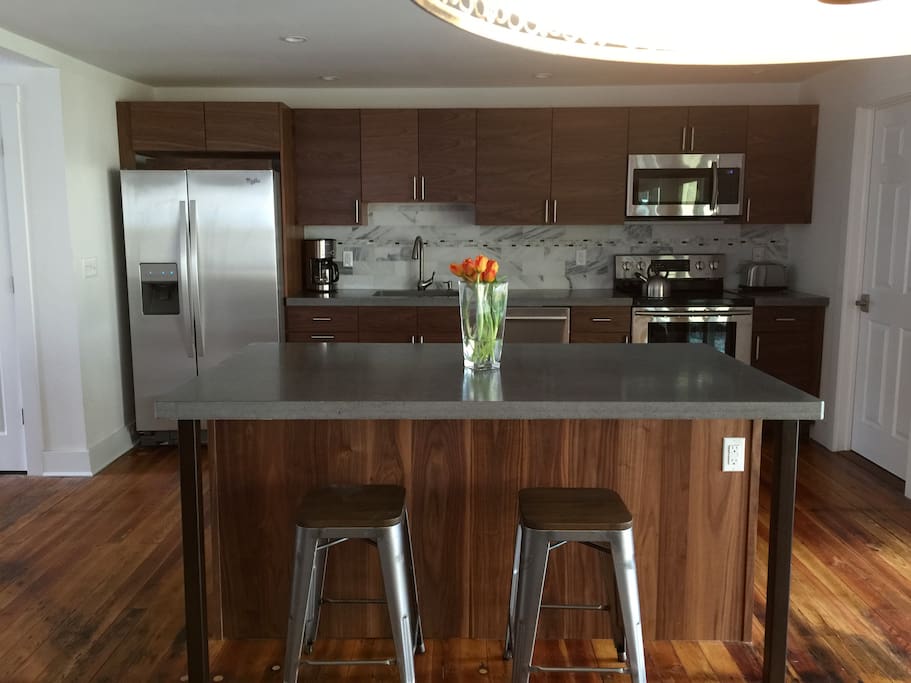 Large island with custom concrete counters