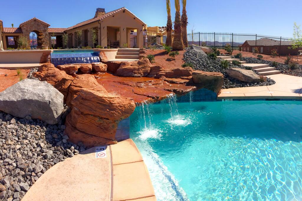 Community Pool - waterfall, waterslide, huge spa, two pool decks, kiddie area!
