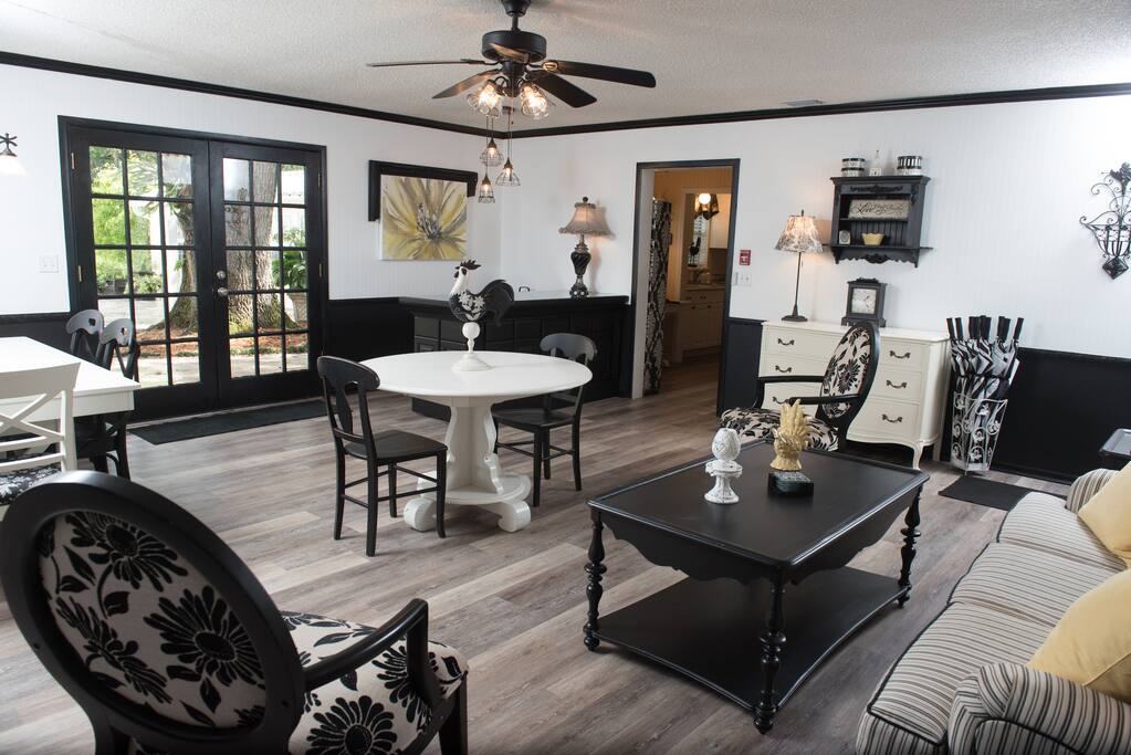 Spacious formal Living and Dining room with bar with a view into the kitchen.