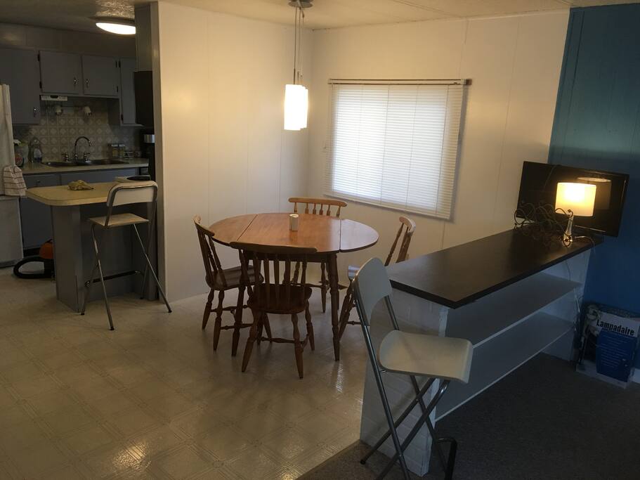 Open concept kitchen, dining room and living room