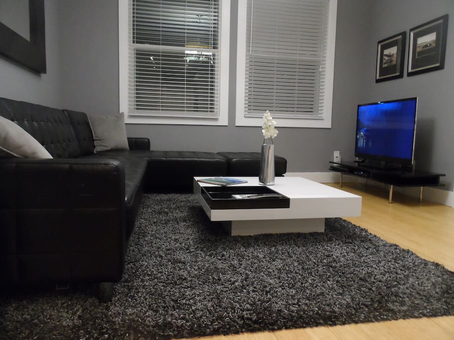 Come and relax in this lovely living room with large LED TV.