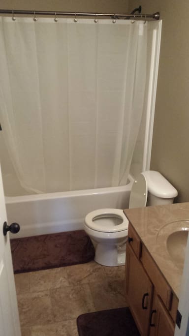 Shared restroom, also a half bath down stairs