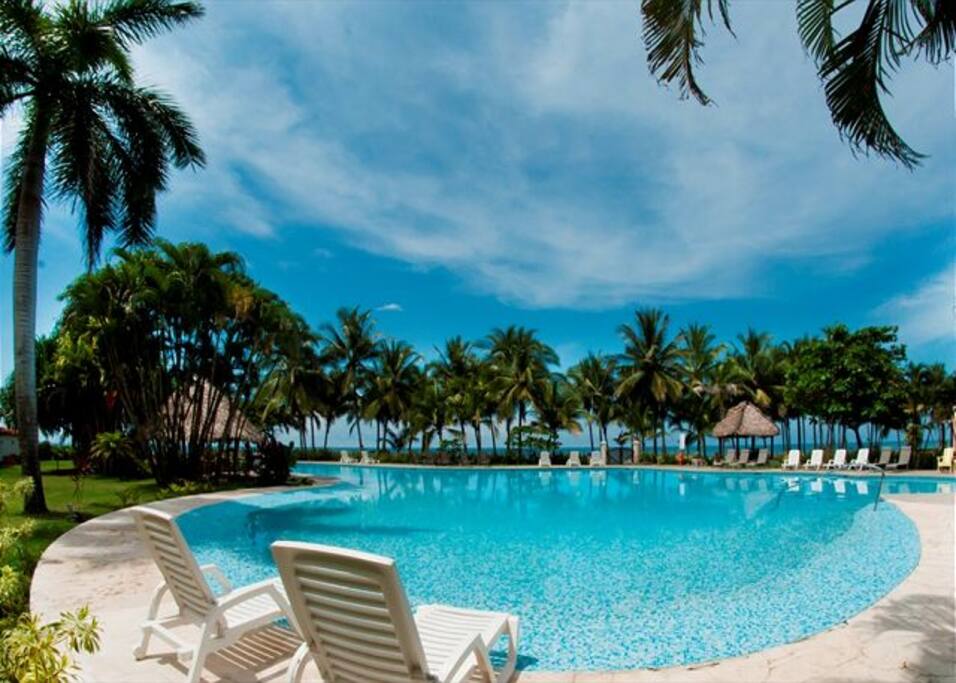 Swim up to the Tiki Bar in Hermosa Palms Beachfront Pool - a short 2 minute walk from house