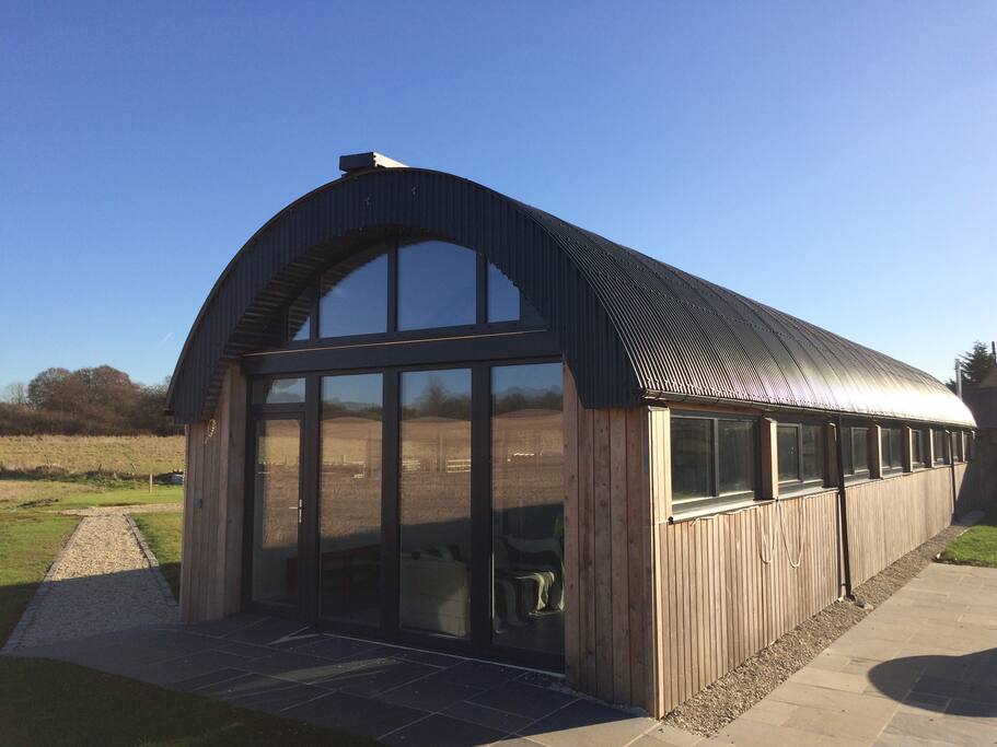 Contemporary Architecture: a rebuilt 1950's cowshed finished with all the comforts of a 2016 luxury bungalow.