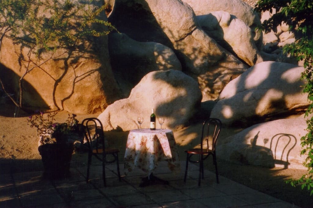 There are five terraces surrounding the park. A stone fire pit is by the boulders.