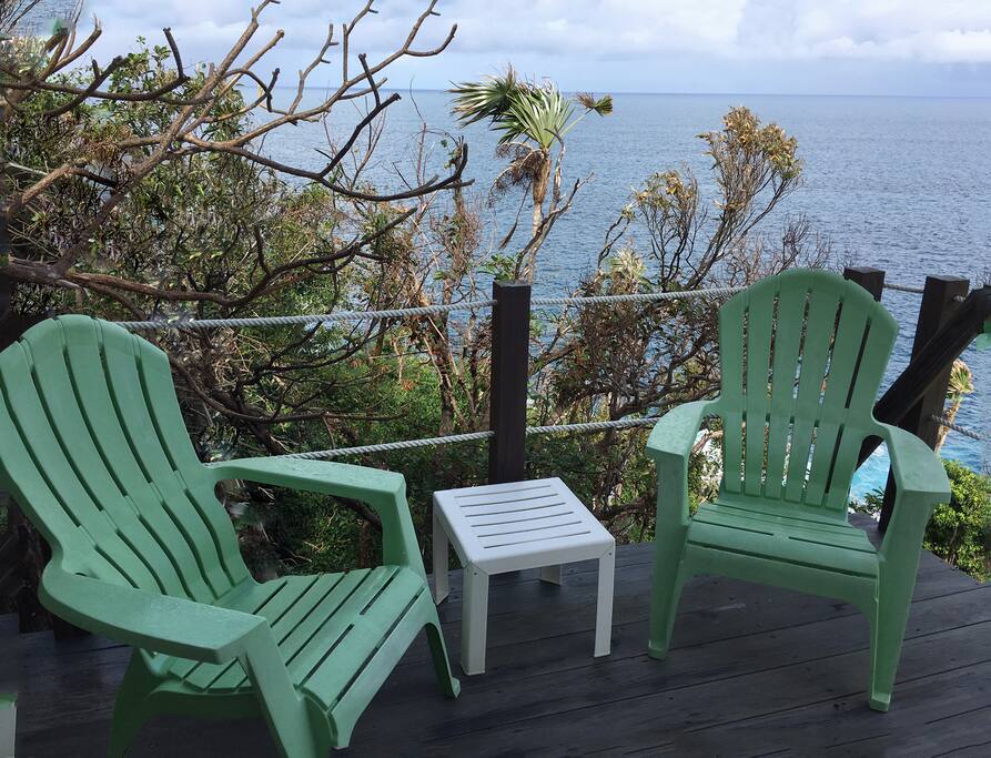 A private deck overlooking the ocean.