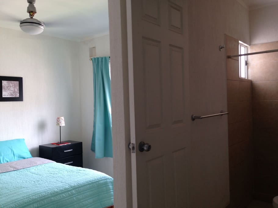 Bedroom and its private bathroom