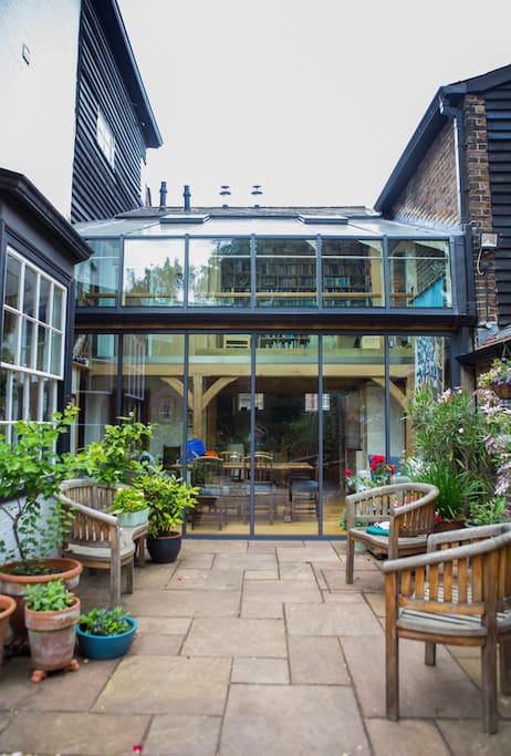 Courtyard looking into dining room and balcony which leads to the guest bedroom.
