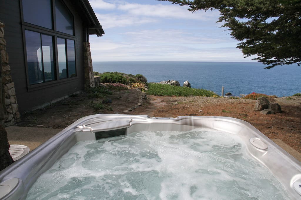 Enjoy a relaxing hot tub with an ocean view