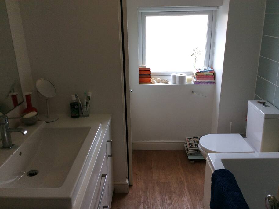 Full-length bath with shower, in shared bathroom just next door