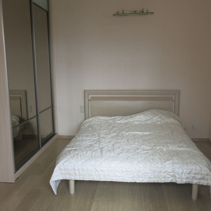 There is a big bed in this room and two-tier bed in the other room