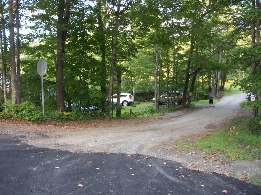 Turning onto the dirt road. We're the first house on the right.