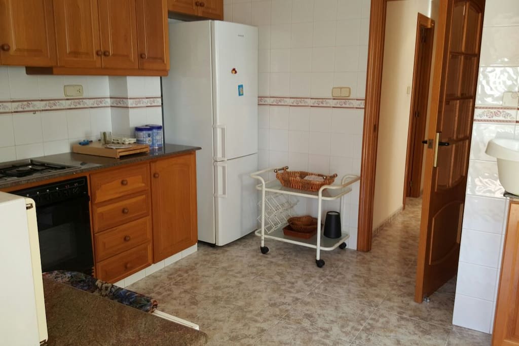 Cocina de 20 m 2 con terraza.