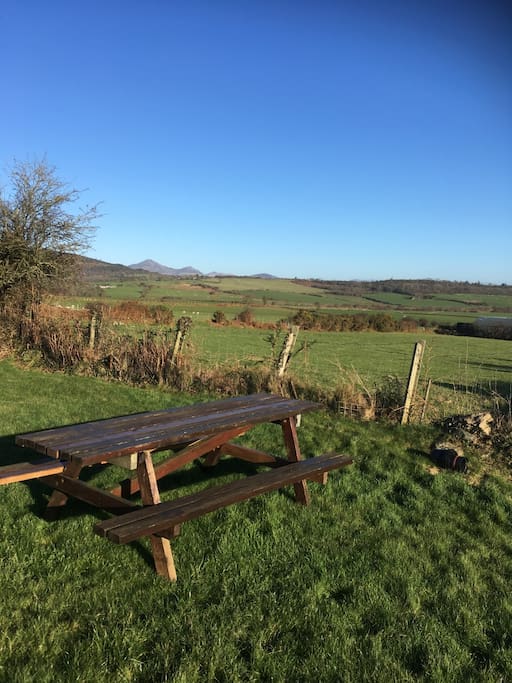 It's not fenced off but you'll have access to a grassy area with stunning views.