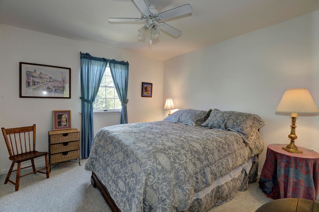 Queen Bed. We've replaced the bedspread and added a dresser.