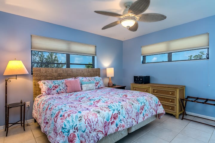 King bed in master bedroom suite.
