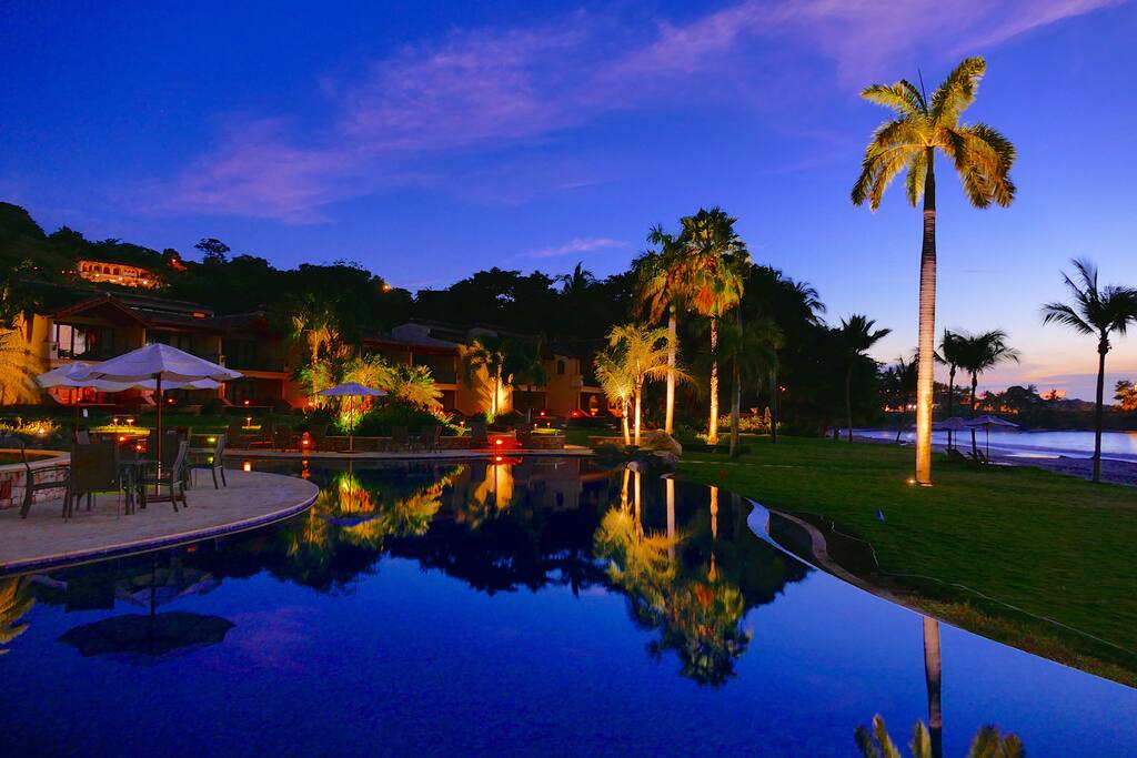 The infinity pool is the perfect place to relax day or night.