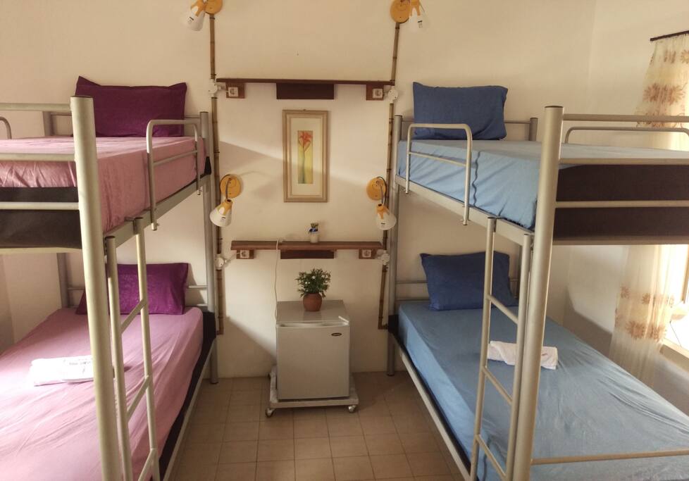 Your quadruple room! each bed is equipped with reading lights and socket to charge your mobiles