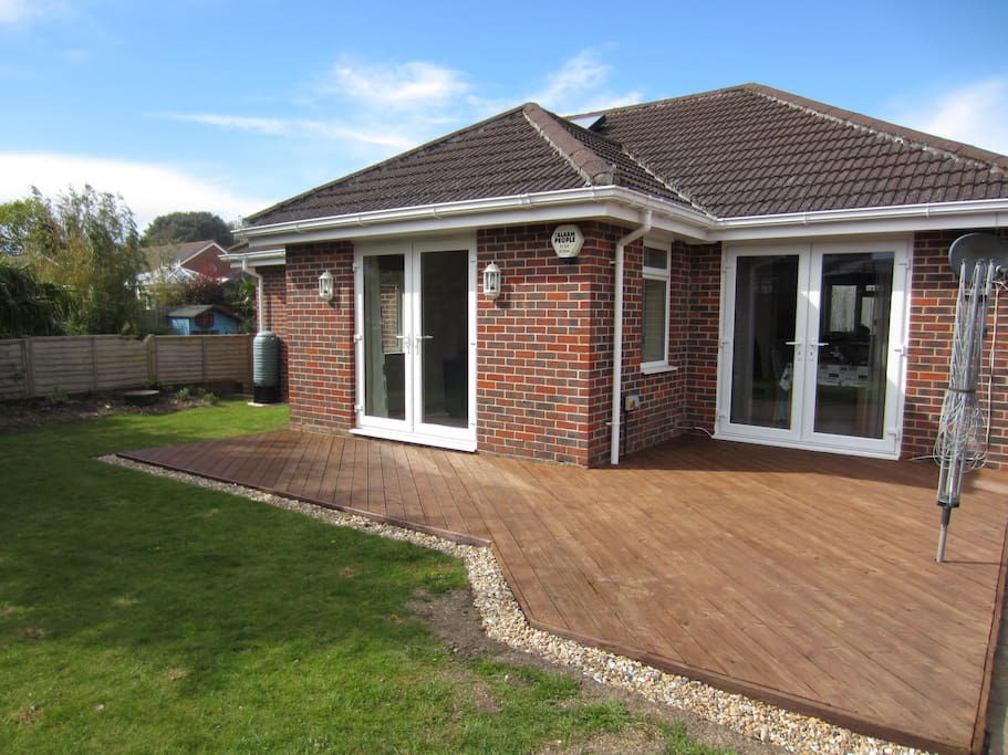 Family friendly outside deck and garden, use of chairs & table to enjoy sunny days