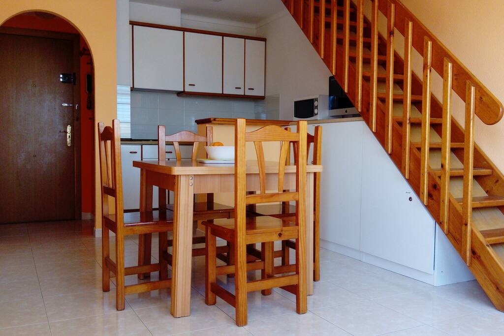 Dining room area and kitchen area