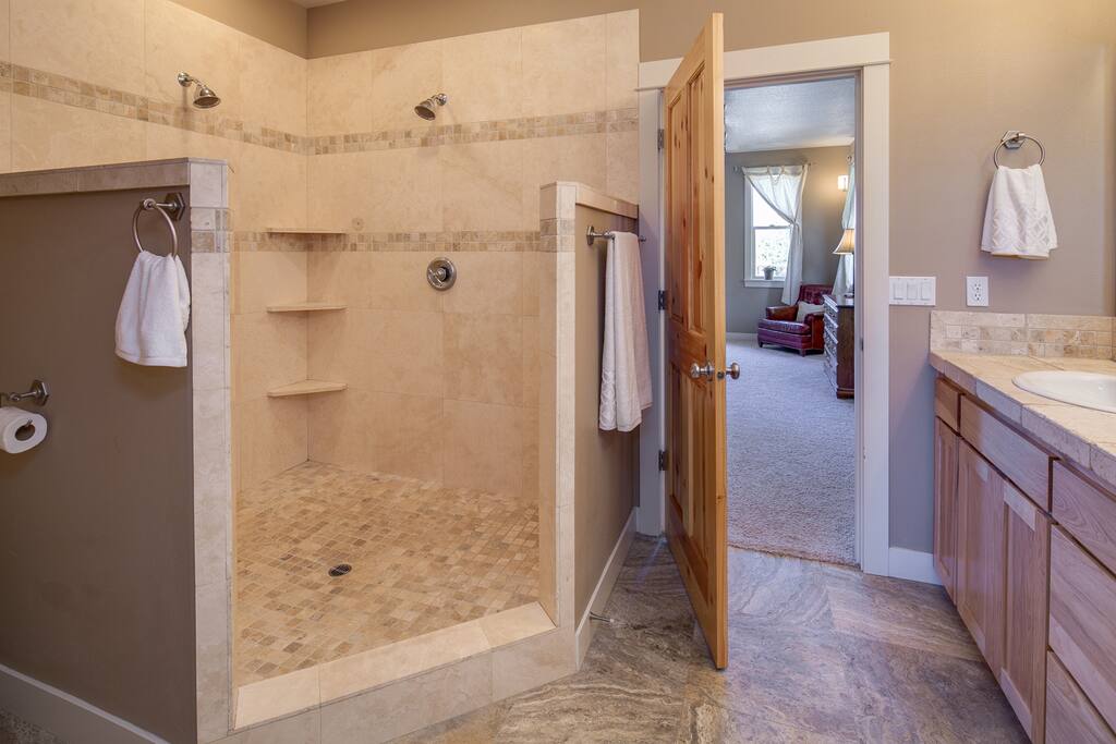 Master bath with dual-head shower.