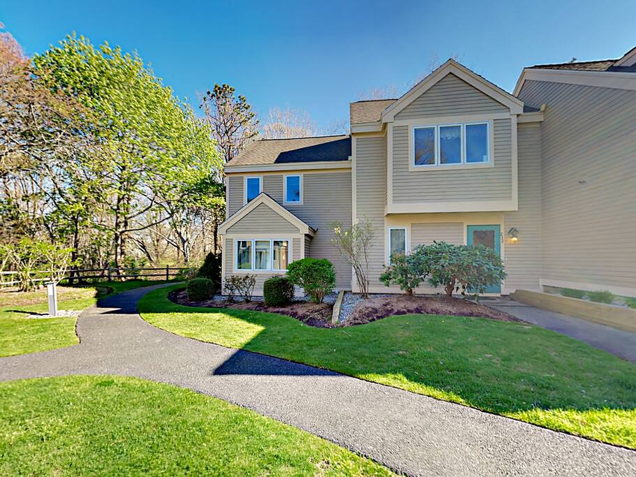 Your corner unit 2-story getaway is surrounded by well-maintained landscape.