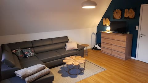 A room with a sunny balcony