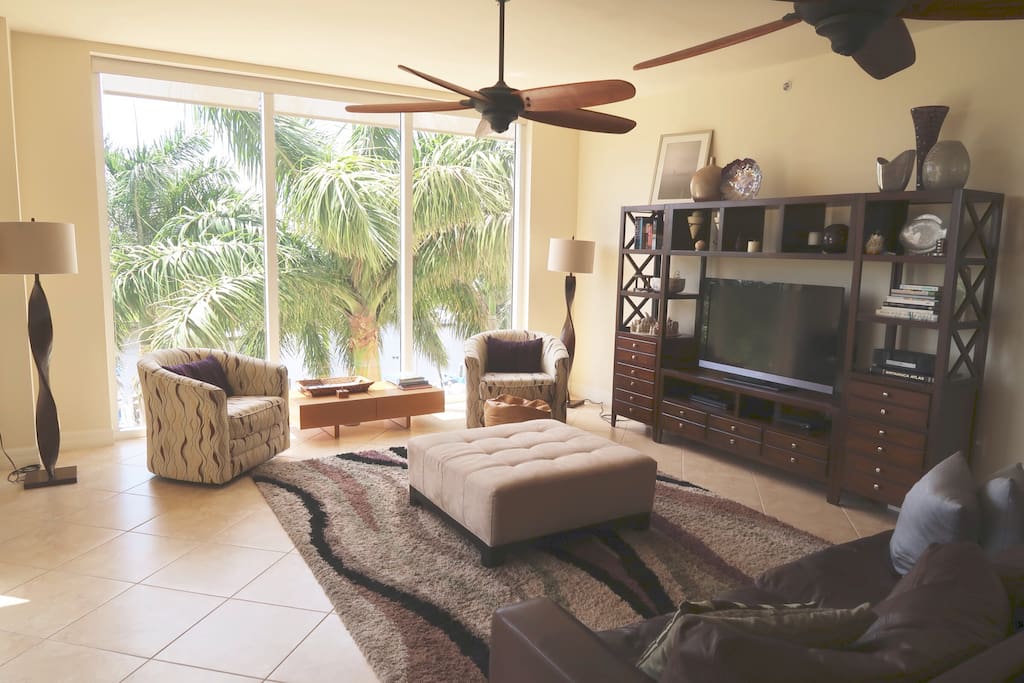 Other side of family room. Sliding glass doors to the Lanai over looking the canal on left.
