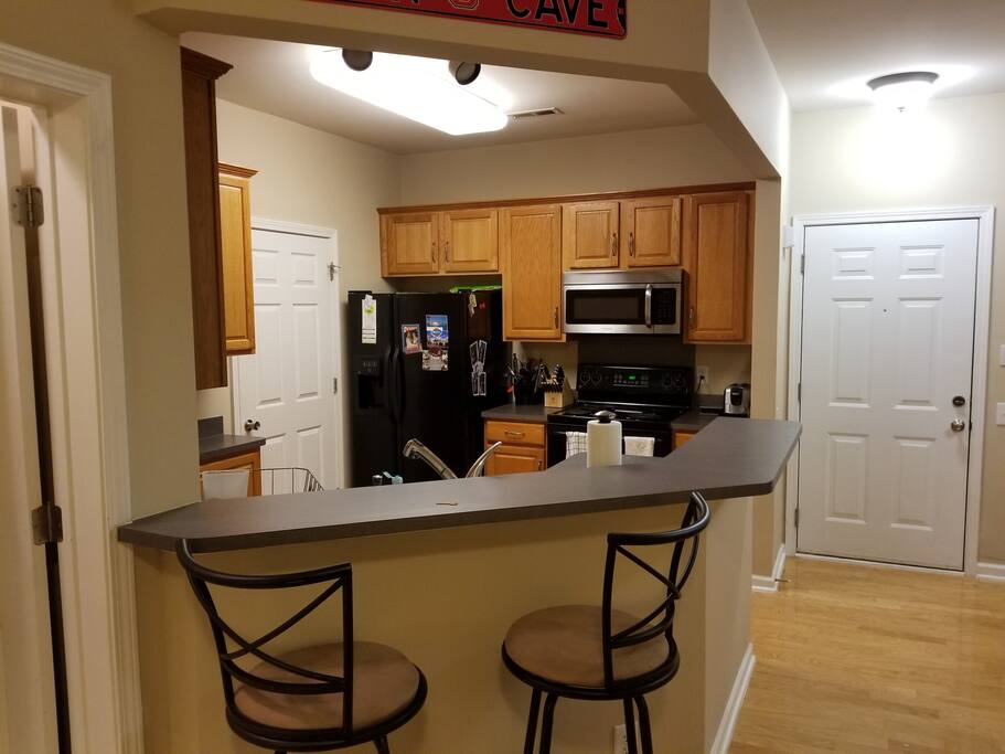 Seating for 2 at the bar in the fully-stocked kitchen