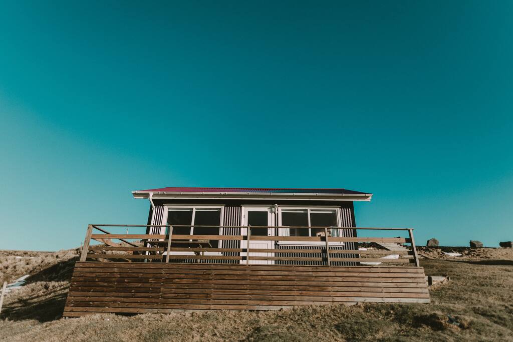 There is a patio in front of each cottage