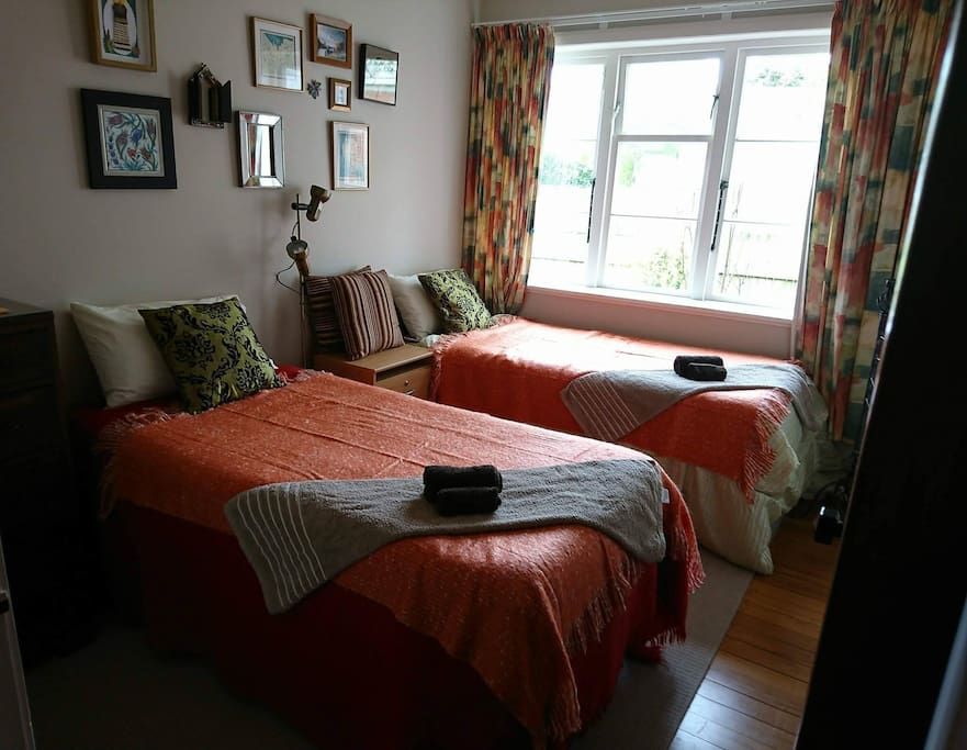 Twin beds in sunny room