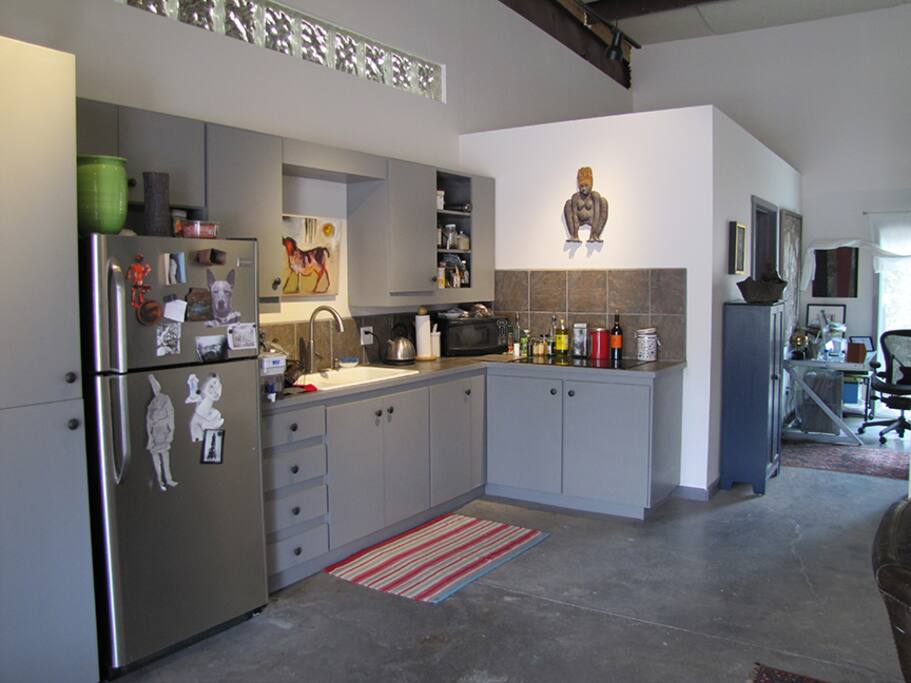 Kitchen, no stove, only cook top and microwave, sink, frig.