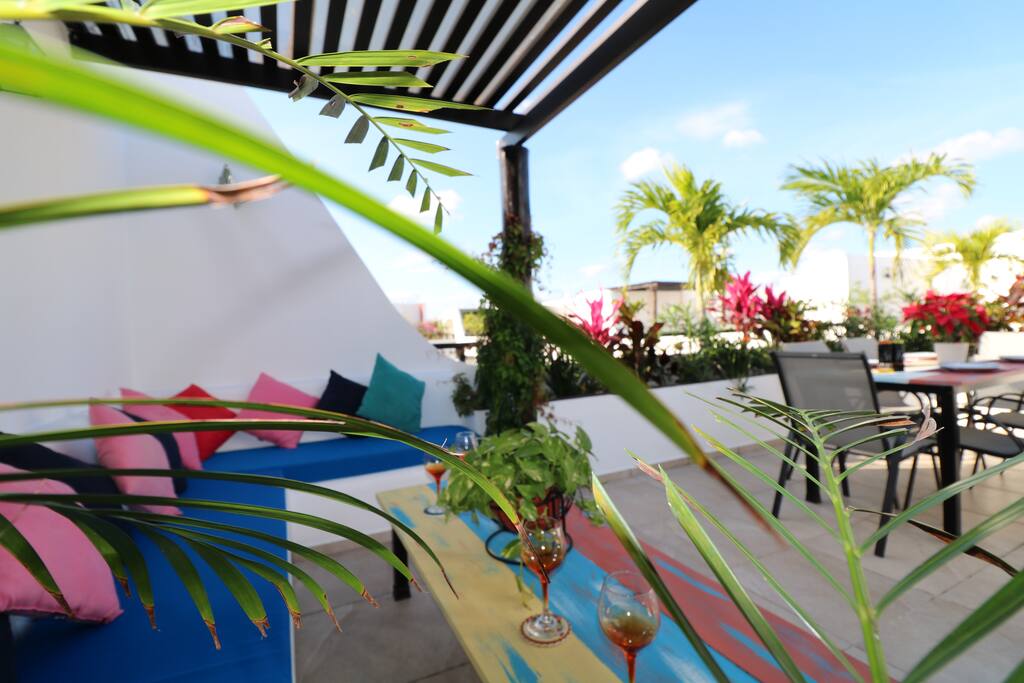Enjoy a nice glass of wine on the cozy rooftop terrace