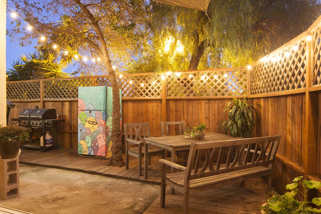 Opposite view of the yard with art piece from local artist!