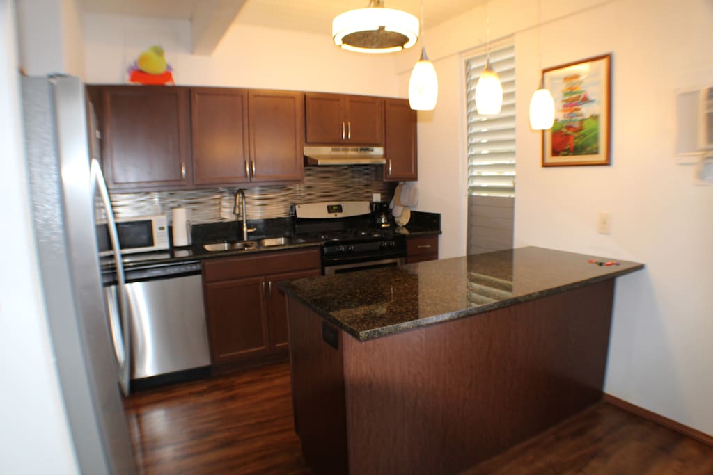 Kitchen with New Appliances and Granite Countertops
