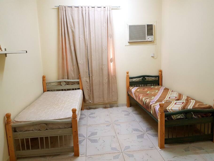 Bedroom 1 have 3 beds غرفة يوجد فيها ثلاثة أسرة