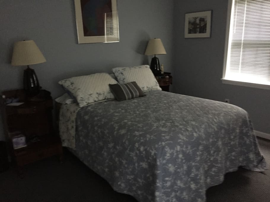 Full size bed primary bedroom