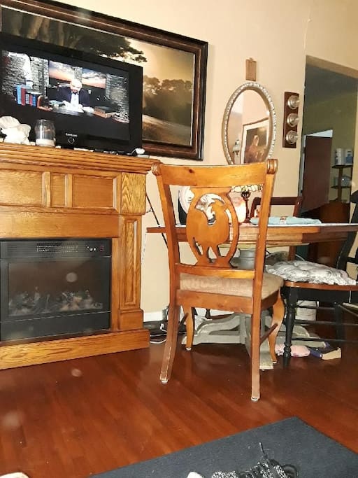 Living room taken from sofa. Small & quaint.