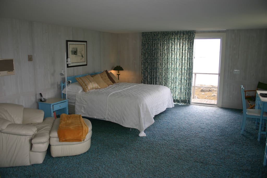 Master bedroom with King bed and DirecTV. Full bath is shared with the two lofts.