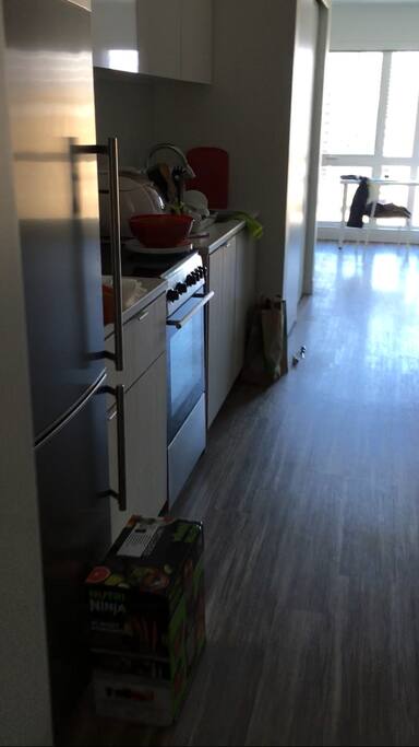 kitchen: fridge, rice cooker, basic cooking & eating utensils and dishwasher