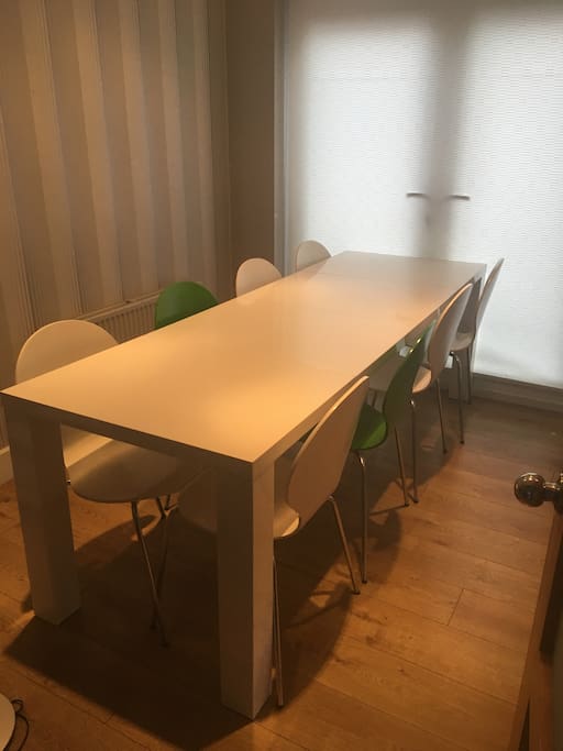 Dining area with extendable table seating 8. (Possible 10 if 1 on each end)