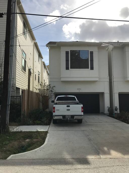 Free-standing home with 2 car garage and space for 2 cars on driveway