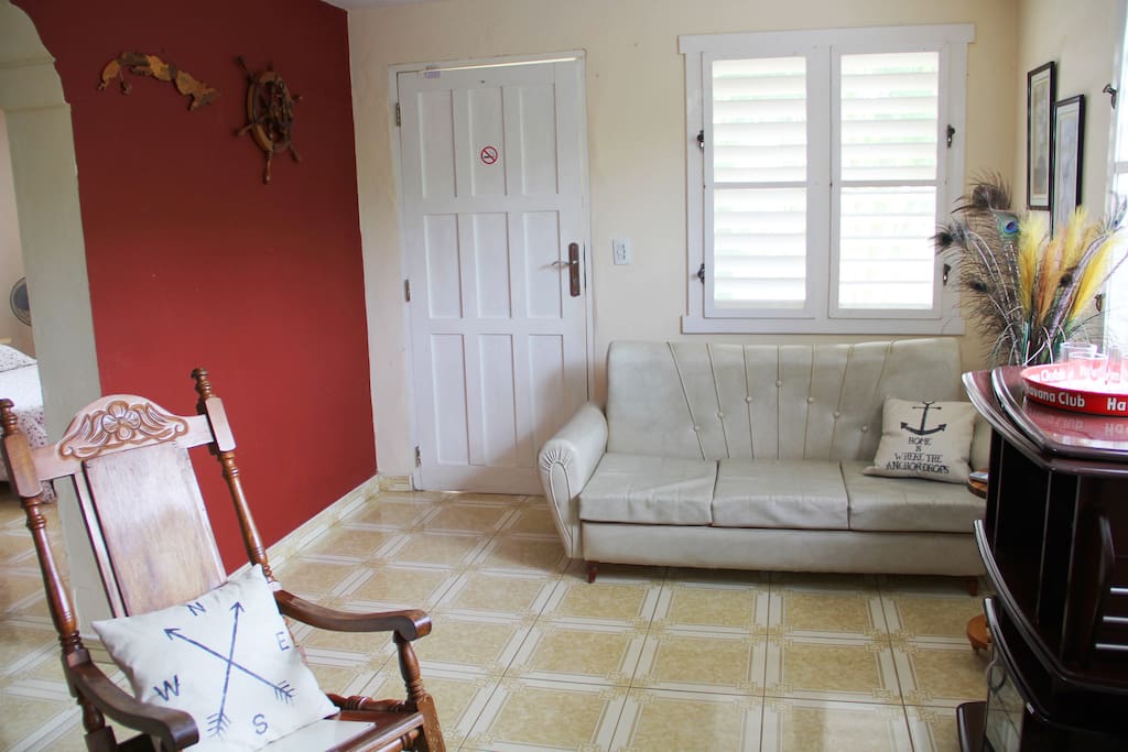 Living room (door seen in picture is front door)