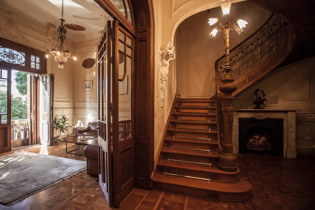 Main staircase off main entrance and living room.