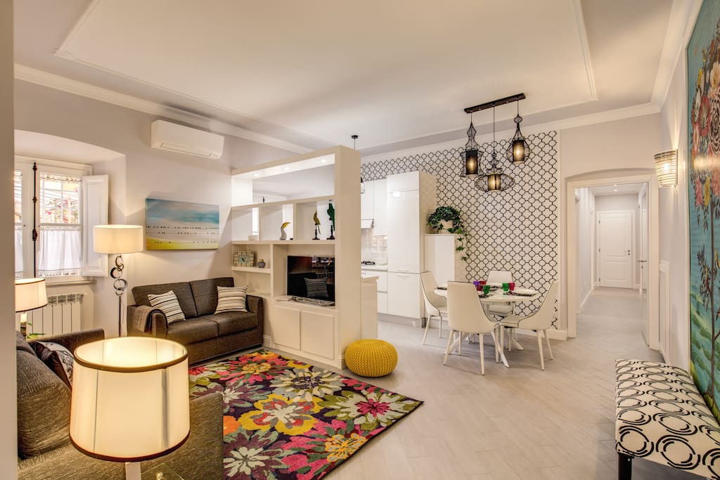 Living room with TV, 1 double sofa bed, 2 seat sofa, air conditioner/ heater and free wifi