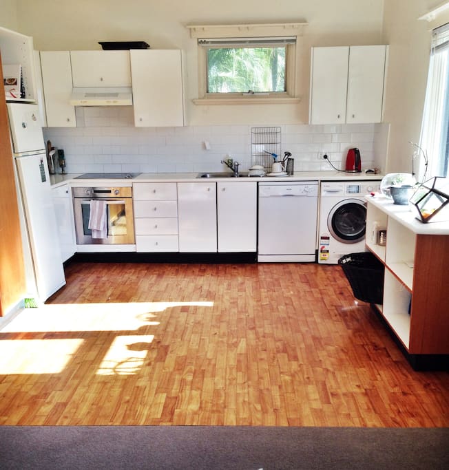 open plan living room and kitchen - lovely and sunny!