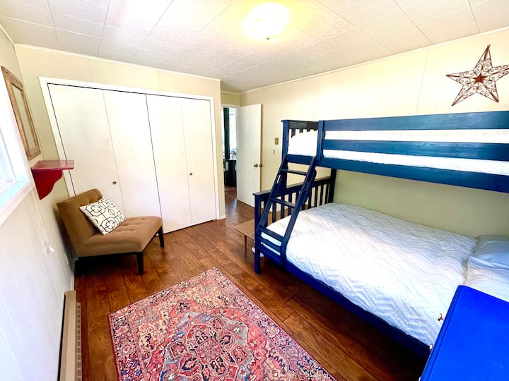 The second bedroom has plenty of storage with a large closet and dresser. There are also convenient hooks for hanging your gear.