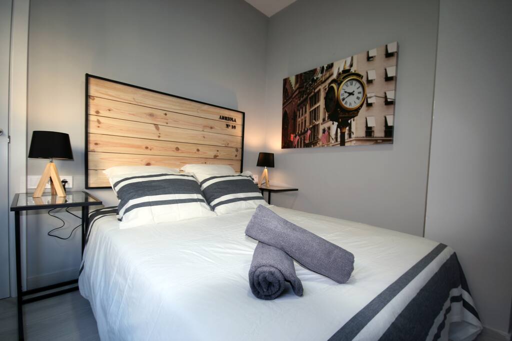 Dormitorio con decoracion nordica.