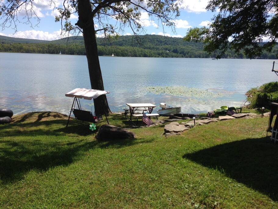 The "beach"! Camp fire, picnic table and swing.
